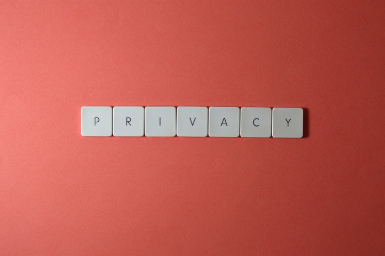 Letter tiles spelling PRIVACY on a red background, representing a data protection tender answer