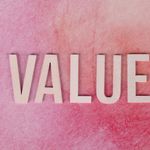 The word 'VALUE' in bold letters on a textured pink background.